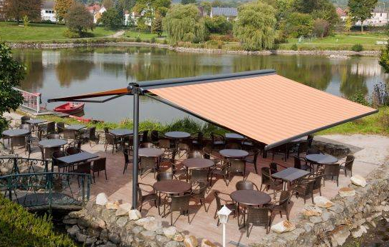 Butterfly awning for outdoor dining